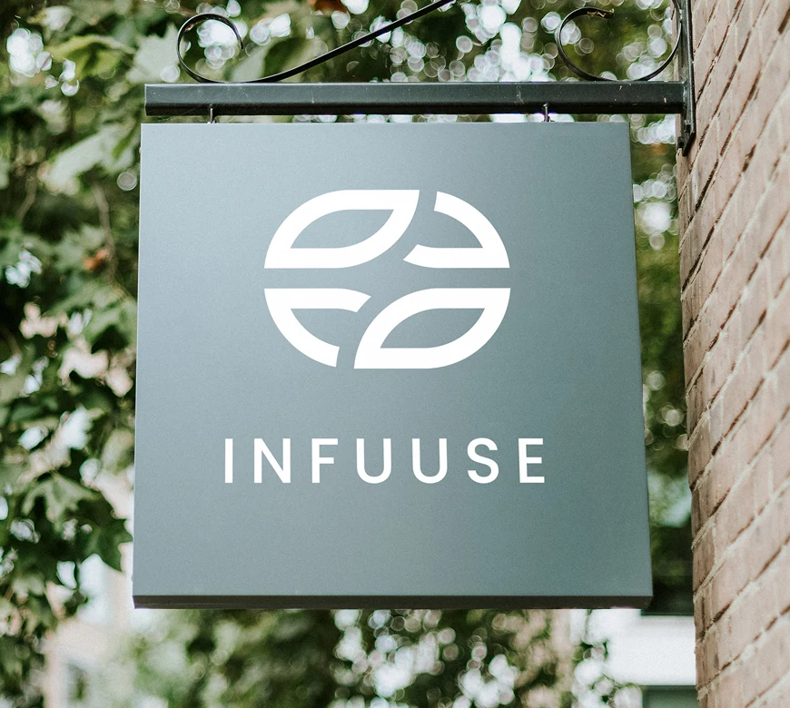 INFUUSE sign on a concrete wall