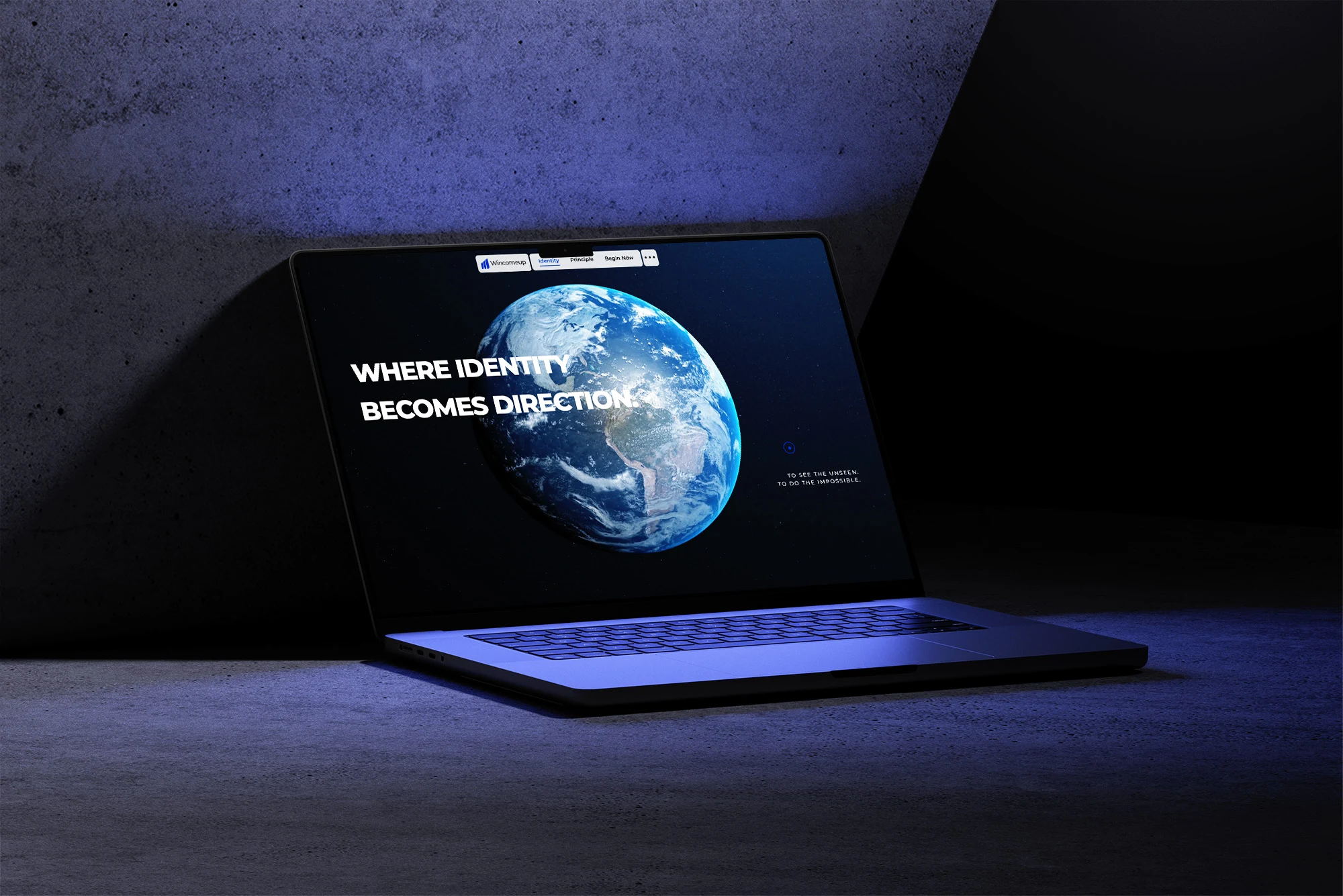 The WincomeUp homepage, “Where identity becomes direction”, on a laptop